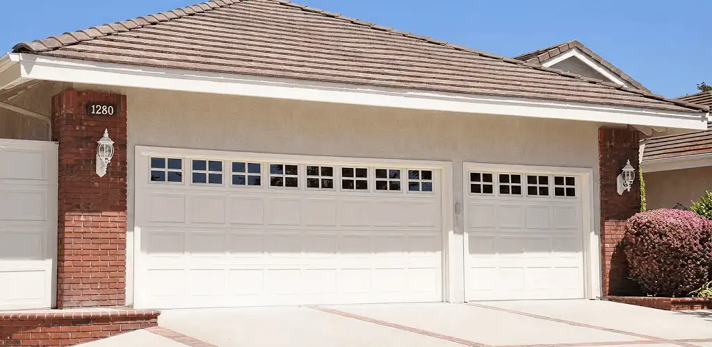 Residential garage door repair service for a double garage door in Akron, OH