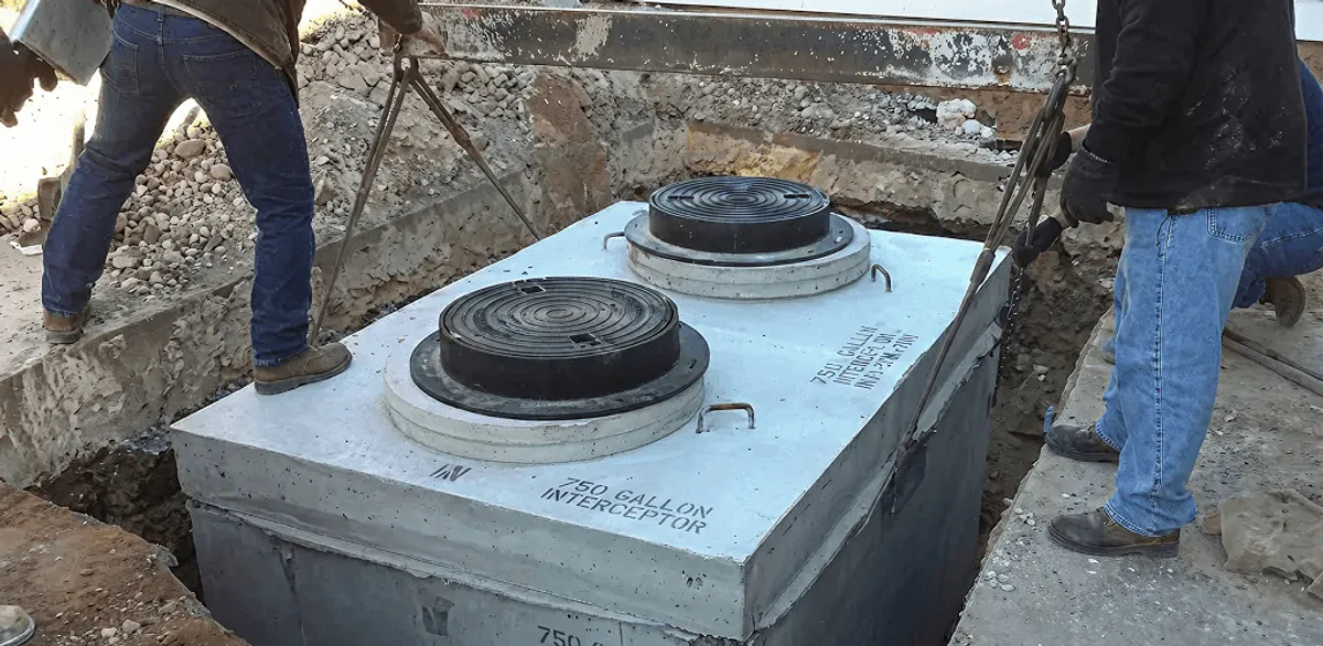 Grease trap installation for a commercial property drainage system in Akron, OH
